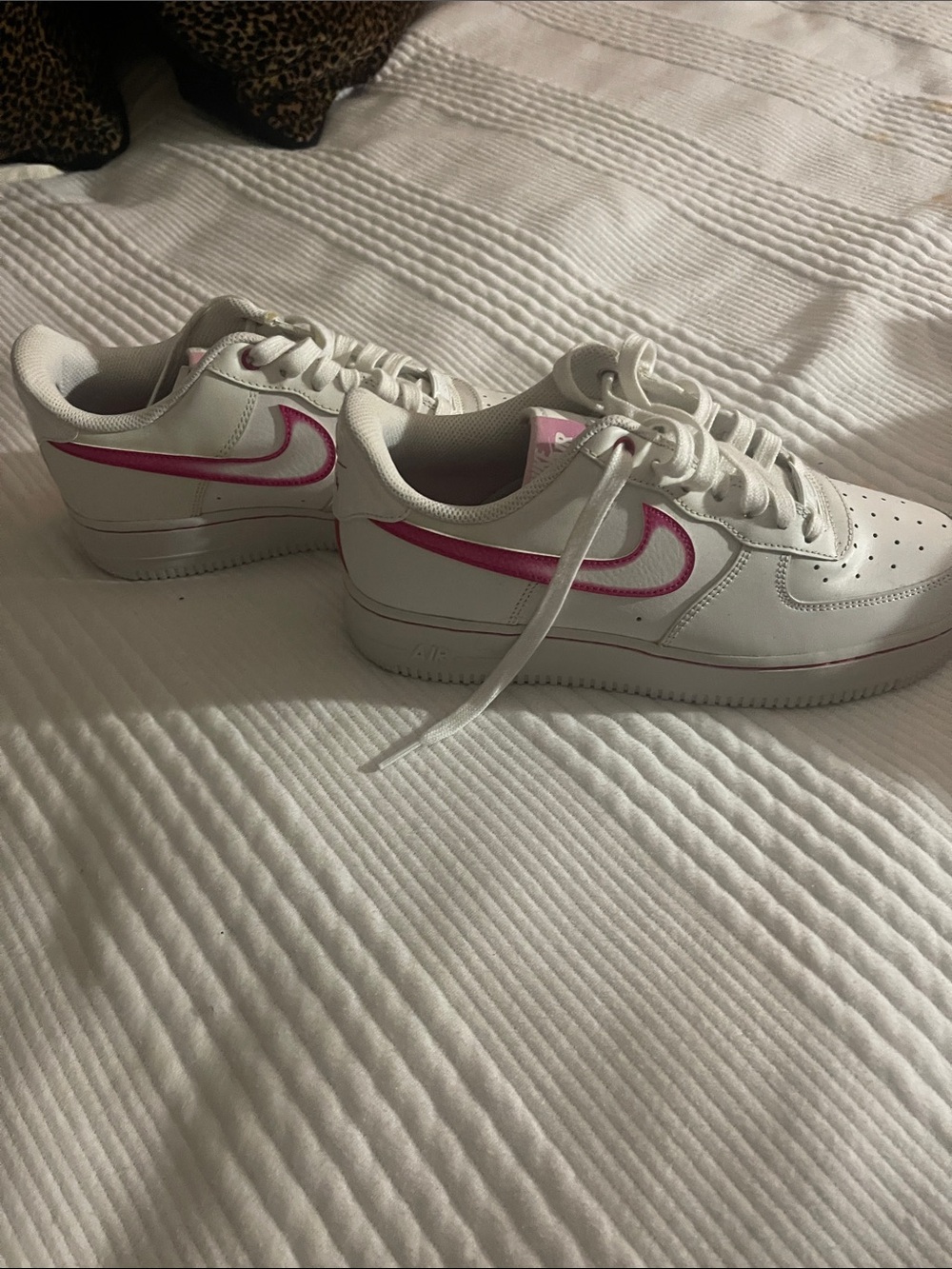 Nike White Low-Top Sneakers with Pink Swoosh